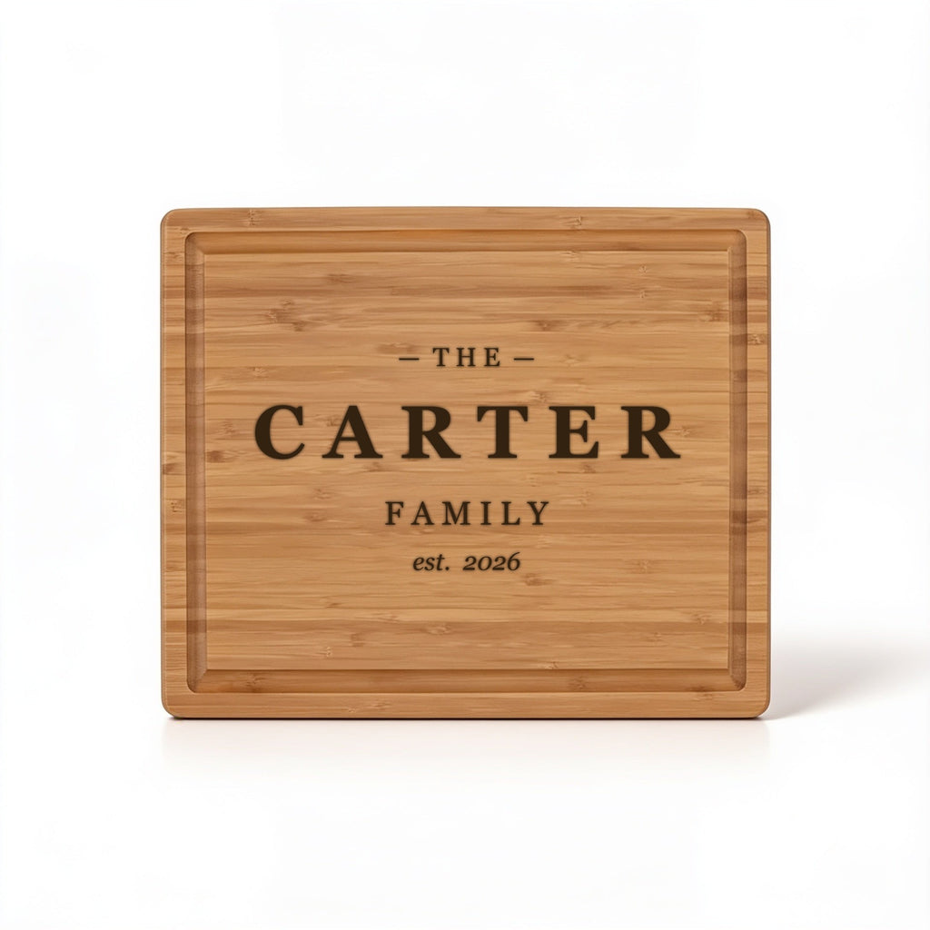 Family name and est. year block design engraved on bamboo cutting board