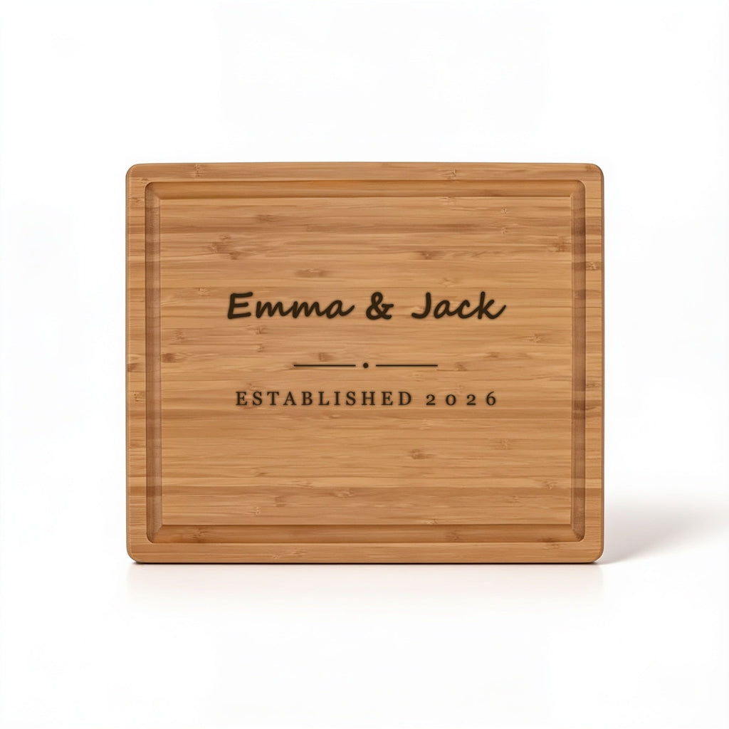 Script first names and established year engraved on bamboo cutting board