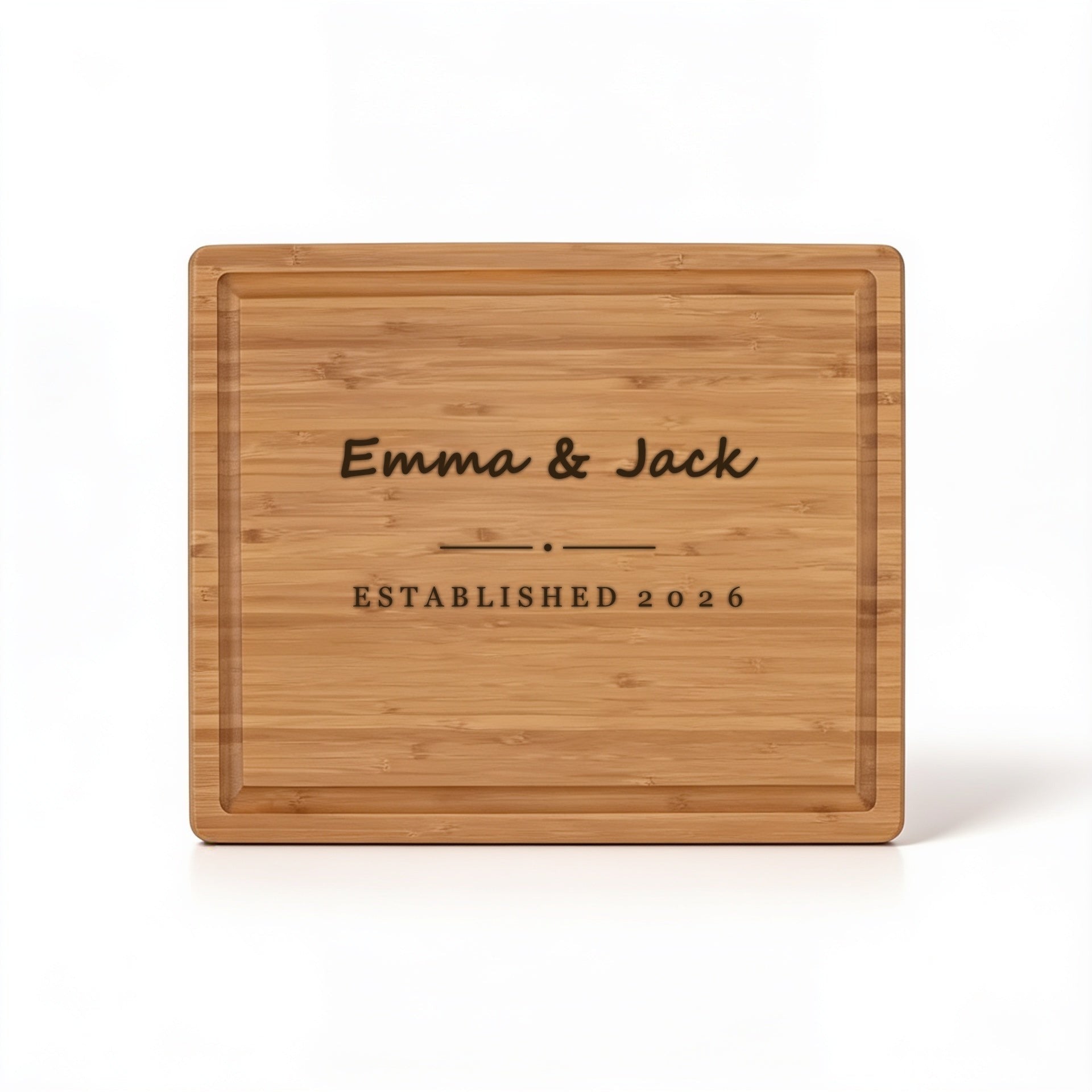 Script first names and established year engraved on bamboo cutting board